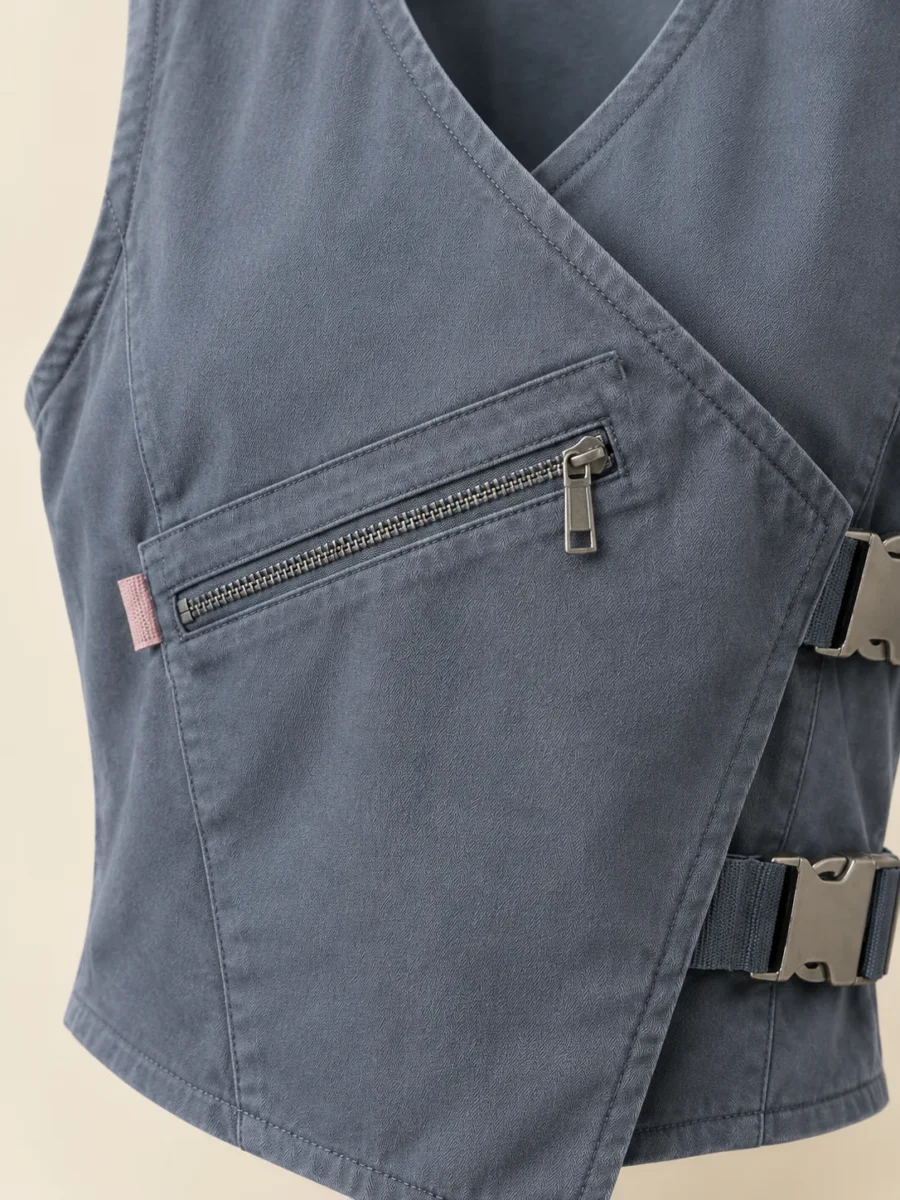 Buckle Wrap Vest in Slate, close-up of pockets and hardware