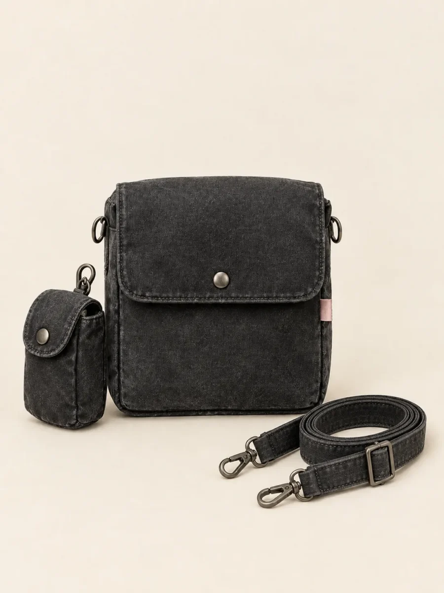 Camera Box Mini Bag with its detachable pieces unclipped and laid beside it