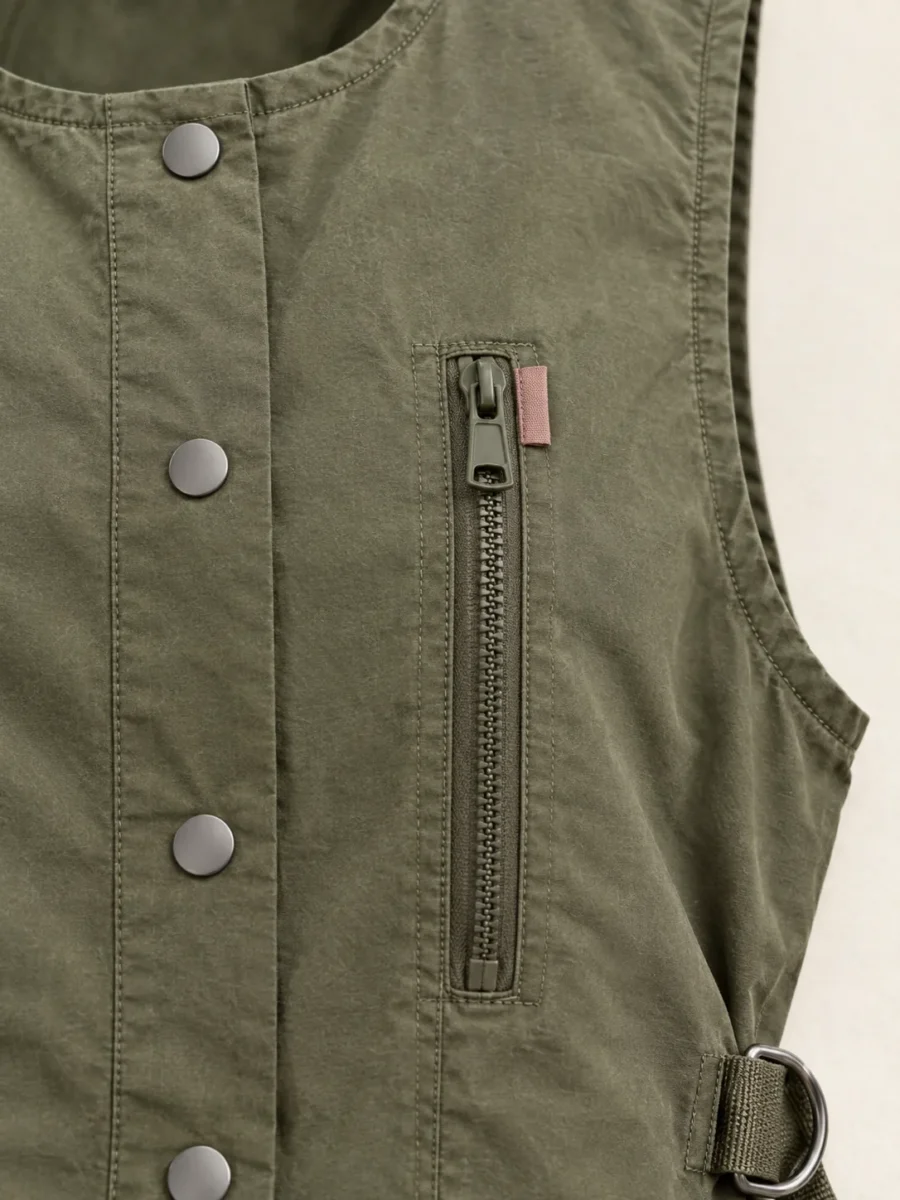 Satchel Strap Vest in Olive, close-up of pockets and hardware